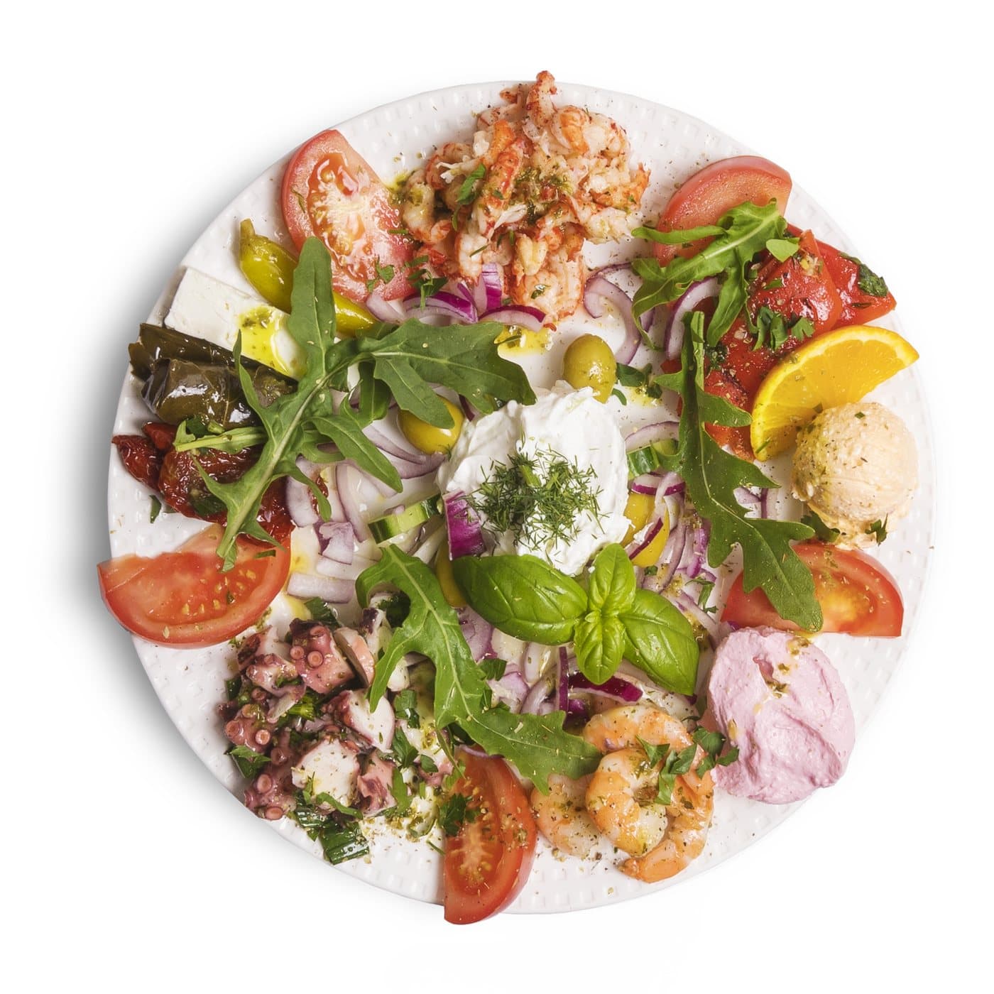 Mixed starter platter with octopus, prawns, vine leaves, feta, tomatoes, rocket and dips